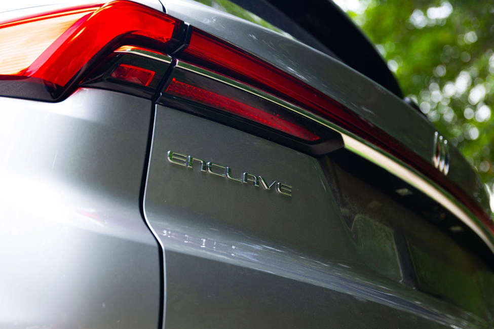 Close-up of a silver Enclave rear taillight