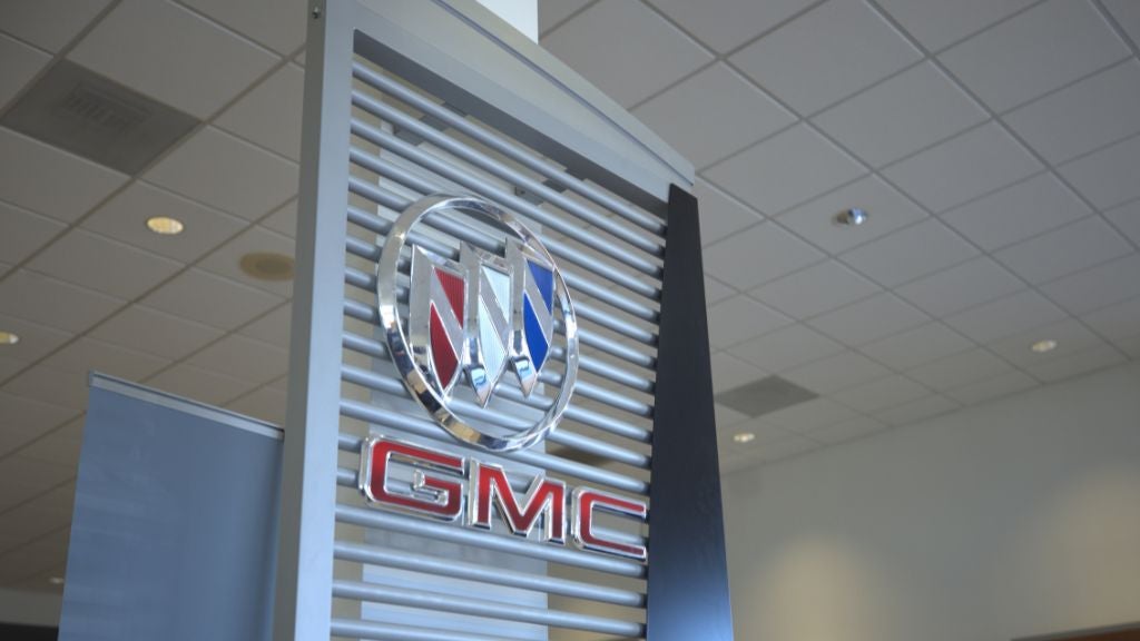 Buick GMC emblems visible inside of Flow Buick GMC of Winston-Salem